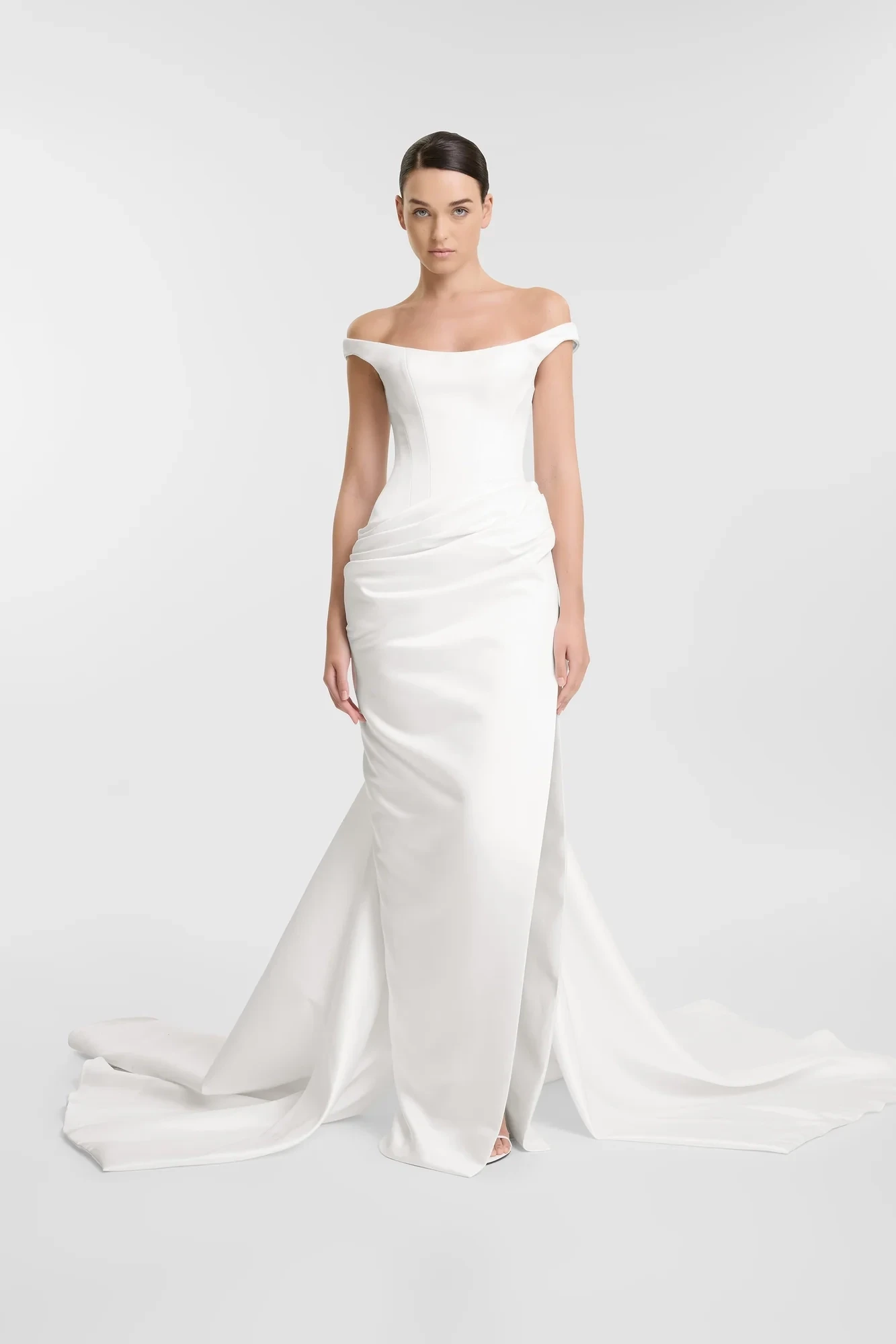 Model wearing a white dress
